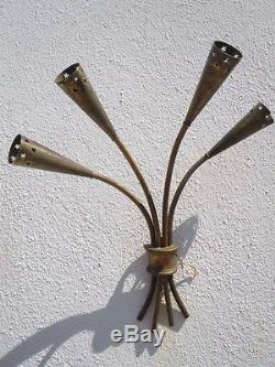 Appliques laiton percé étoiles bronze vers 1950 style Royère
