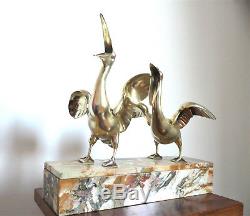 Art Déco importante sculpture bronze doré 1930 couple de pélican sur marbre