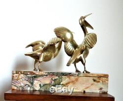 Art Déco importante sculpture bronze doré 1930 couple de pélican sur marbre