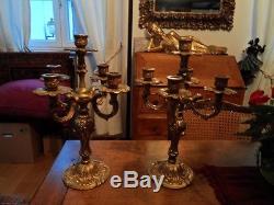 Deux magnifiques chandeliers cinq feux en bronze doré massif