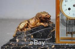 Garniture Art déco en marbre portor et bronze doré aux lions 1930