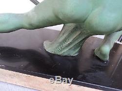 Grande Statue Regule Art Deco signé S. Melani patine bronze Personnage