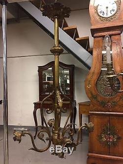 Lustre suspension style Louis XVI en bronze