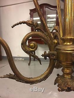 Lustre suspension style Louis XVI en bronze