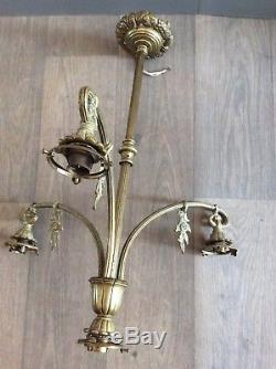 Monture de lustre quatre feux en bronze à décor floral géométrique Art Déco