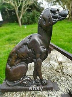 Paire de chenet en bronze chien assis