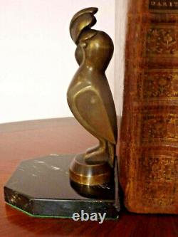 Paire de serre livre en bronze signé G. H. LAURENT