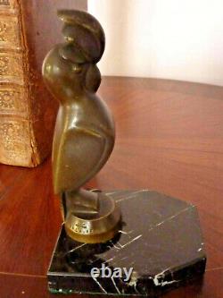 Paire de serre livre en bronze signé G. H. LAURENT