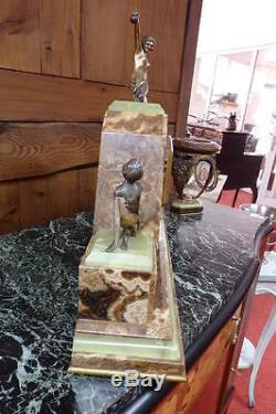 Pendule et ses deux cassolettes en bronze et onyx époque Art Déco