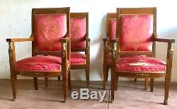 Quatre fauteuils style empire en acajou ornementation de bronze. XX siècle