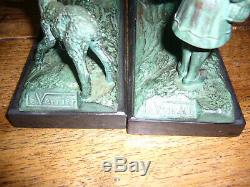 Rare paire de serre livres Art déco en bronze signés Max Leverrier (1891-1973)