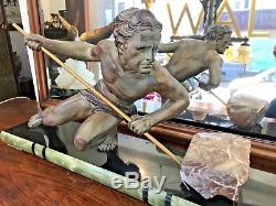 Sculpture ART DECO Homme à l'effort signée BUCHET, régule à patine bronze