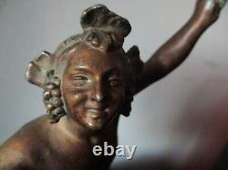 Statuette en regule patine bronze d un faune denudant une nymphe ART DECO